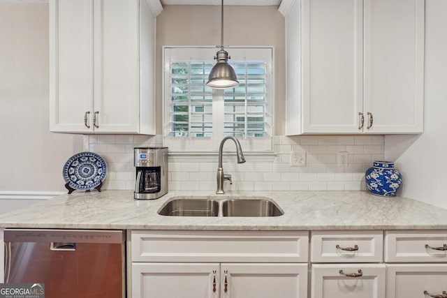 412 Rock Creek Dr, Peachtree City, GA 30269 - kitchen with dishwasher, a sink, backsplash, and white cabinets