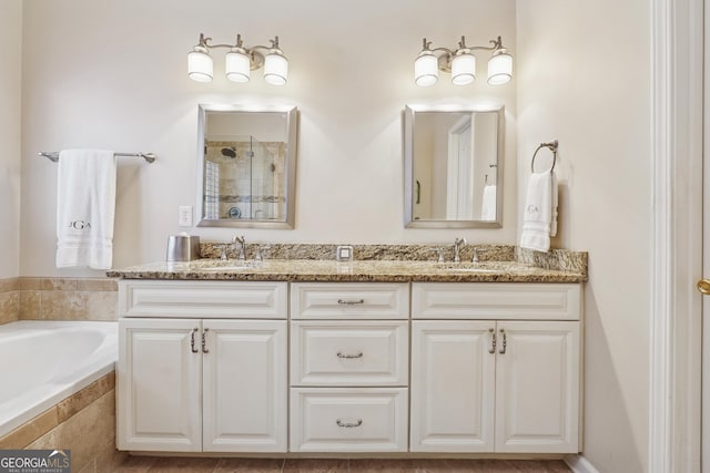 412 Rock Creek Dr, Peachtree City, GA 30269 - full bath with double vanity, a tile shower, and a garden tub