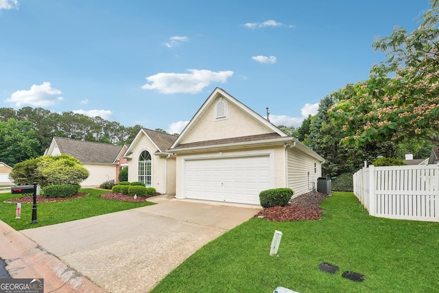 412 Rock Creek Dr, Peachtree City, GA 30269 - traditional home featuring stucco siding, concrete driveway, an attached garage, and central AC unit