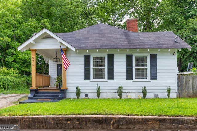 575 E Main St, Buford, GA 30518 - view of front of property with roof with shingles, a chimney, and crawl space