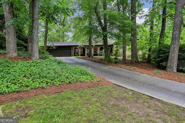 2700 Regency Dr E, Tucker, GA 30084 - view of front of home with driveway and a garage