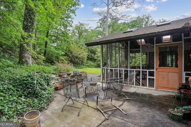 2700 Regency Dr E, Tucker, GA 30084 - view of patio / terrace with a sunroom