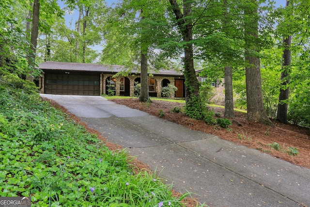 2700 Regency Dr E, Tucker, GA 30084 - view of front of house featuring a garage and driveway