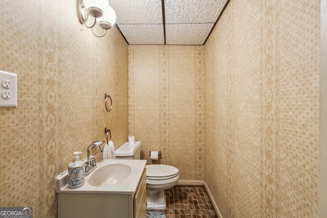 2700 Regency Dr E, Tucker, GA 30084 - half bath with vanity, toilet, and tile patterned floors