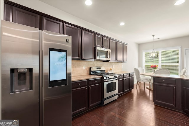 4965 Brierstone Dr, Alpharetta, GA 30004 - kitchen featuring stainless steel appliances, dark brown cabinetry, backsplash, recessed lighting, and dark wood-style floors