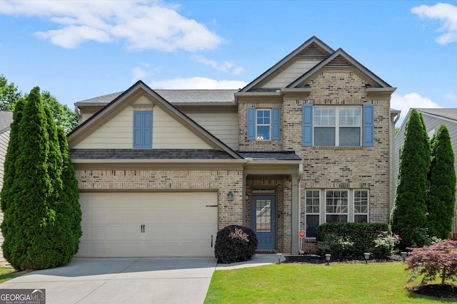 4965 Brierstone Dr, Alpharetta, GA 30004 - view of front of property featuring brick siding, concrete driveway, a front lawn, and a garage