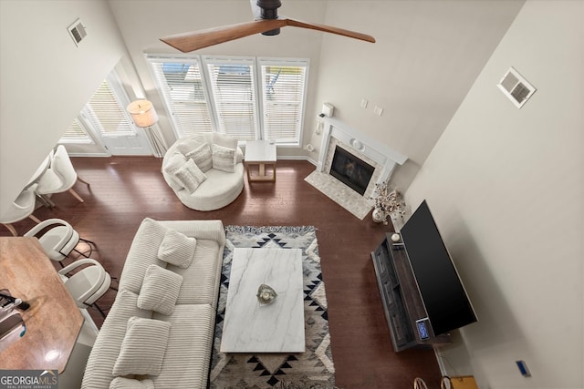 4965 Brierstone Dr, Alpharetta, GA 30004 - living room with a ceiling fan, healthy amount of natural light, wood finished floors, and a fireplace with flush hearth