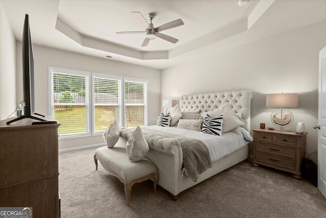4965 Brierstone Dr, Alpharetta, GA 30004 - bedroom featuring a raised ceiling, carpet, and a ceiling fan