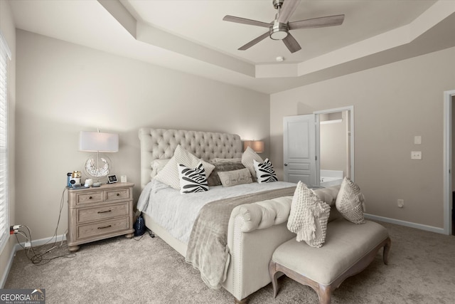 4965 Brierstone Dr, Alpharetta, GA 30004 - bedroom with light carpet, baseboards, and a tray ceiling