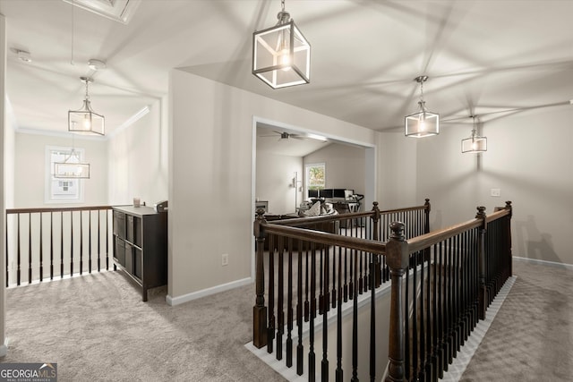 4965 Brierstone Dr, Alpharetta, GA 30004 - hallway with an upstairs landing, carpet flooring, attic access, baseboards, and ornamental molding