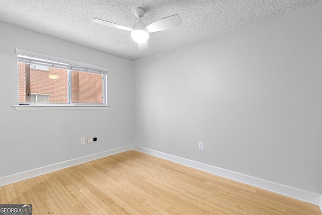 387 Ralph Mcgill Blvd NE Unit K, Atlanta, GA 30312 - unfurnished room with light wood finished floors, ceiling fan, and a textured ceiling
