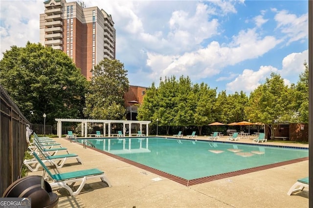 387 Ralph Mcgill Blvd NE Unit K, Atlanta, GA 30312 - community pool with a pergola and a patio area