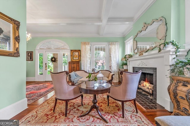 403 E Robert Toombs Ave, Washington, GA 30673 - sitting room featuring a lit fireplace, beam ceiling, ornamental molding, coffered ceiling, and wood finished floors