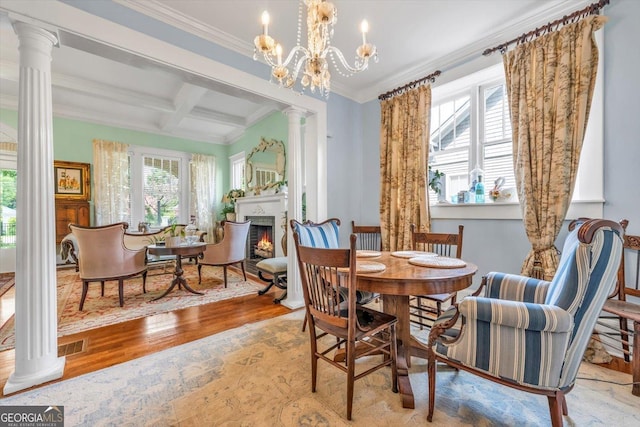 403 E Robert Toombs Ave, Washington, GA 30673 - dining room featuring crown molding, wood finished floors, a lit fireplace, beamed ceiling, and coffered ceiling