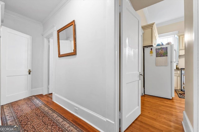 403 E Robert Toombs Ave, Washington, GA 30673 - corridor with light wood-style flooring and ornamental molding