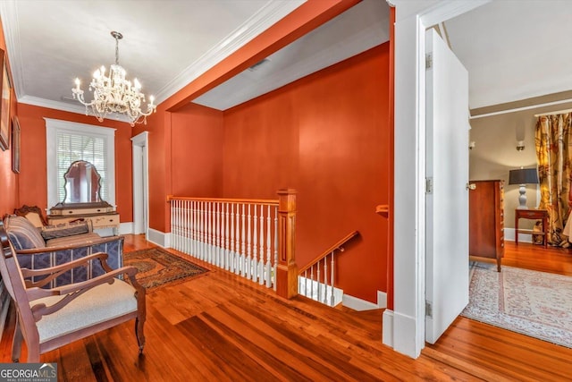 403 E Robert Toombs Ave, Washington, GA 30673 - corridor with an upstairs landing, wood finished floors, a chandelier, baseboards, and crown molding