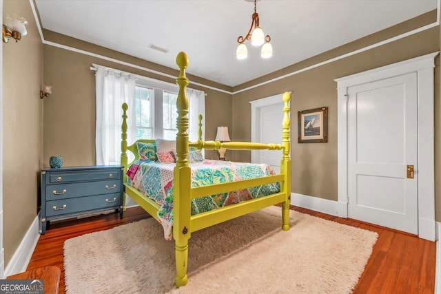 403 E Robert Toombs Ave, Washington, GA 30673 - bedroom with wood finished floors and baseboards