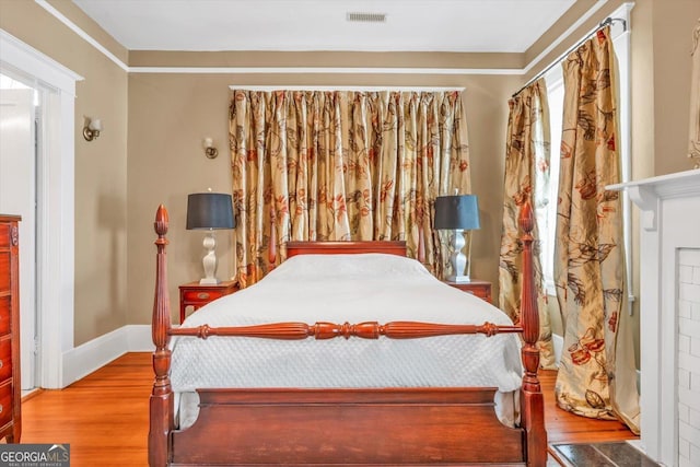 403 E Robert Toombs Ave, Washington, GA 30673 - bedroom featuring wood finished floors and baseboards