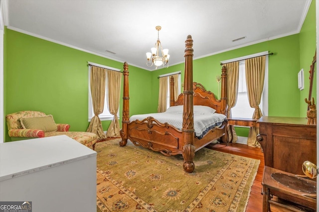 403 E Robert Toombs Ave, Washington, GA 30673 - bedroom featuring a chandelier, crown molding, and wood finished floors