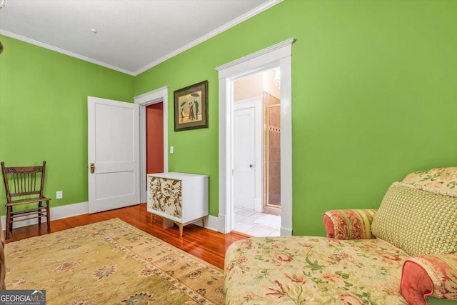 403 E Robert Toombs Ave, Washington, GA 30673 - bedroom featuring crown molding, wood finished floors, and baseboards