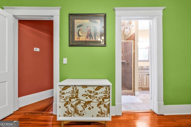 403 E Robert Toombs Ave, Washington, GA 30673 - hallway with baseboards and wood finished floors
