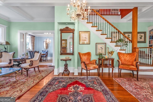403 E Robert Toombs Ave, Washington, GA 30673 - living area with a chandelier, wood finished floors, ornamental molding, stairs, and beamed ceiling