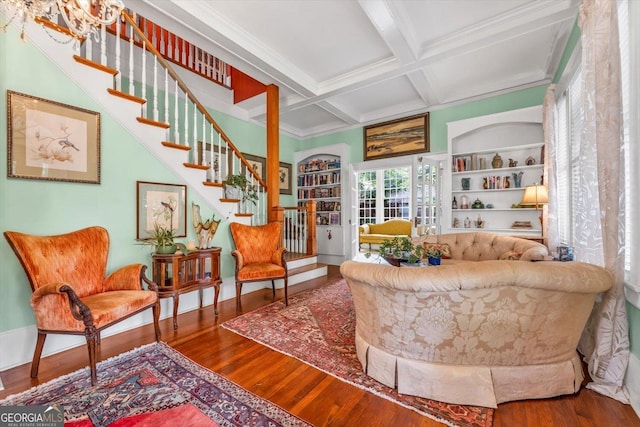 403 E Robert Toombs Ave, Washington, GA 30673 - sitting room featuring wood finished floors, beamed ceiling, stairs, coffered ceiling, and built in shelves