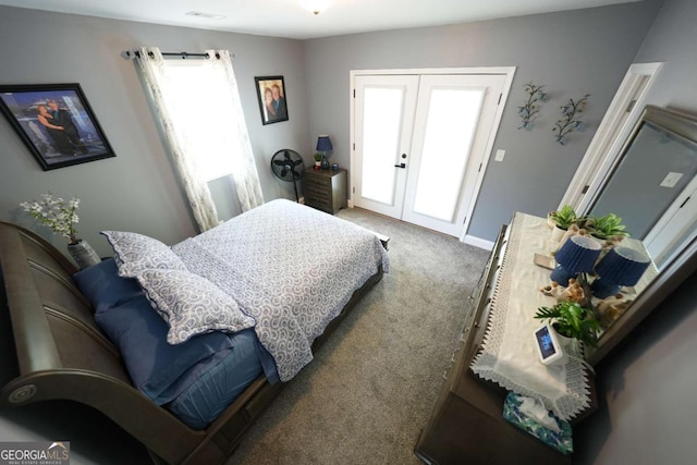531 Beaver Pond Rd, Carrollton, GA 30117 - bedroom featuring french doors and carpet floors