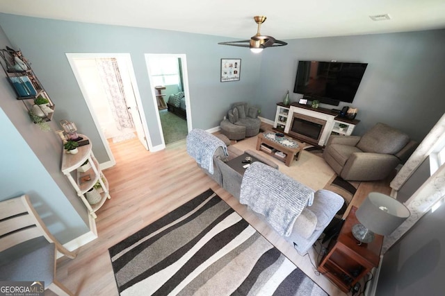 531 Beaver Pond Rd, Carrollton, GA 30117 - living room featuring light wood-type flooring and a ceiling fan