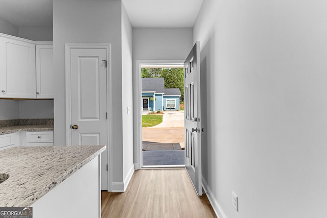 213 Lenox Cir, Lagrange, GA 30241 - doorway to outside with light wood-type flooring and baseboards