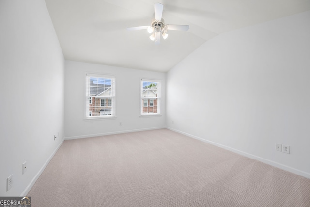 3655 Chattahoochee Summit Dr SE Unit 16, Atlanta, GA 30339 - unfurnished room with lofted ceiling, light carpet, a ceiling fan, and baseboards