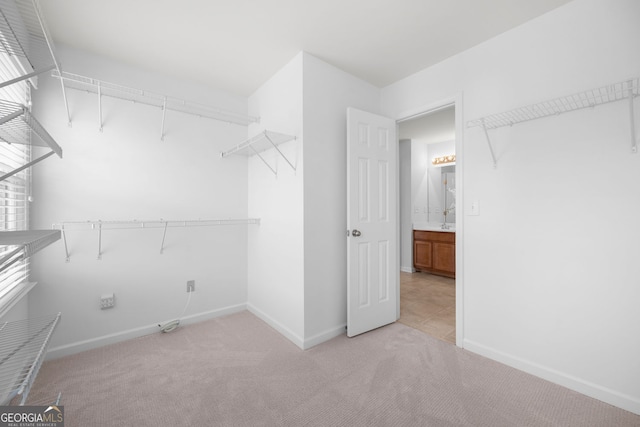 3655 Chattahoochee Summit Dr SE Unit 16, Atlanta, GA 30339 - walk in closet with light colored carpet