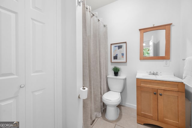 3655 Chattahoochee Summit Dr SE Unit 16, Atlanta, GA 30339 - bathroom with vanity, toilet, tile patterned floors, and baseboards
