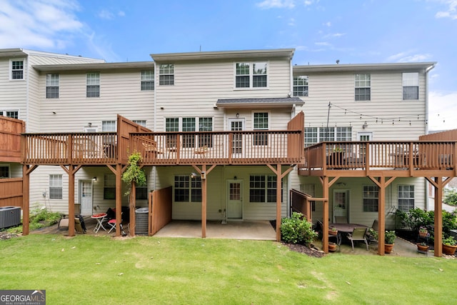 3655 Chattahoochee Summit Dr SE Unit 16, Atlanta, GA 30339 - rear view of property with central air condition unit, a lawn, a deck, and a patio