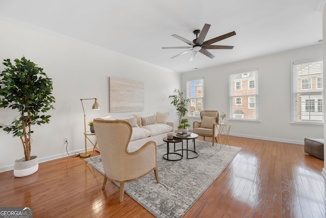 3655 Chattahoochee Summit Dr SE Unit 16, Atlanta, GA 30339 - living room featuring a ceiling fan, baseboards, hardwood / wood-style floors, and crown molding
