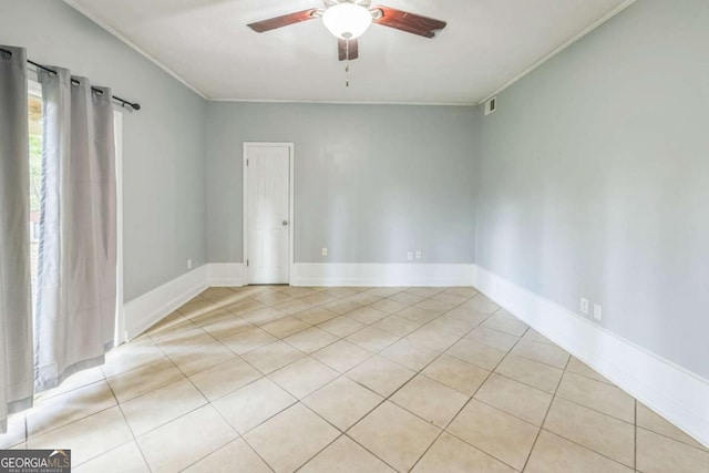 4572 Colonial Rd, Augusta, GA 30907 - empty room featuring crown molding, ceiling fan, and light tile patterned floors