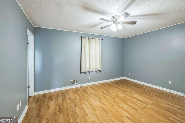 4572 Colonial Rd, Augusta, GA 30907 - empty room with a ceiling fan, light wood-style floors, and a textured ceiling