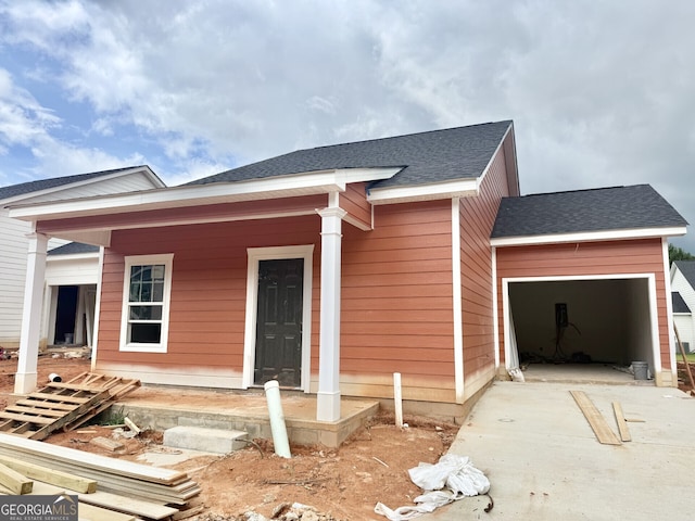 211 Lenox Cir, Lagrange, GA 30241 - view of front of property featuring an attached garage, concrete driveway, and roof with shingles
