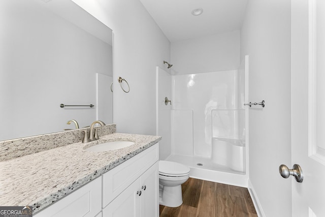 211 Lenox Cir, Lagrange, GA 30241 - bathroom featuring toilet, vanity, a shower, and wood finished floors