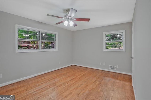 622 Sheffield Rd, Norcross, GA 30071 - unfurnished room featuring wood finished floors, baseboards, and a ceiling fan