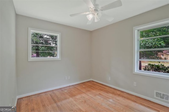 622 Sheffield Rd, Norcross, GA 30071 - empty room with baseboards, light wood-type flooring, and a ceiling fan