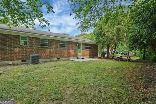 622 Sheffield Rd, Norcross, GA 30071 - rear view of property with brick siding, central AC unit, crawl space, a lawn, and entry steps