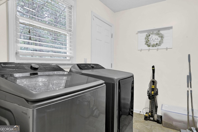 4180 Gables Pl, Buford, GA 30519 - washroom with washing machine and dryer and plenty of natural light