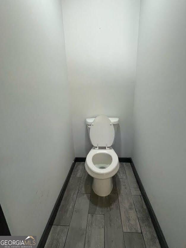 185 Glenrose Cir SW, Atlanta, GA 30354 - bathroom with baseboards and wood finished floors