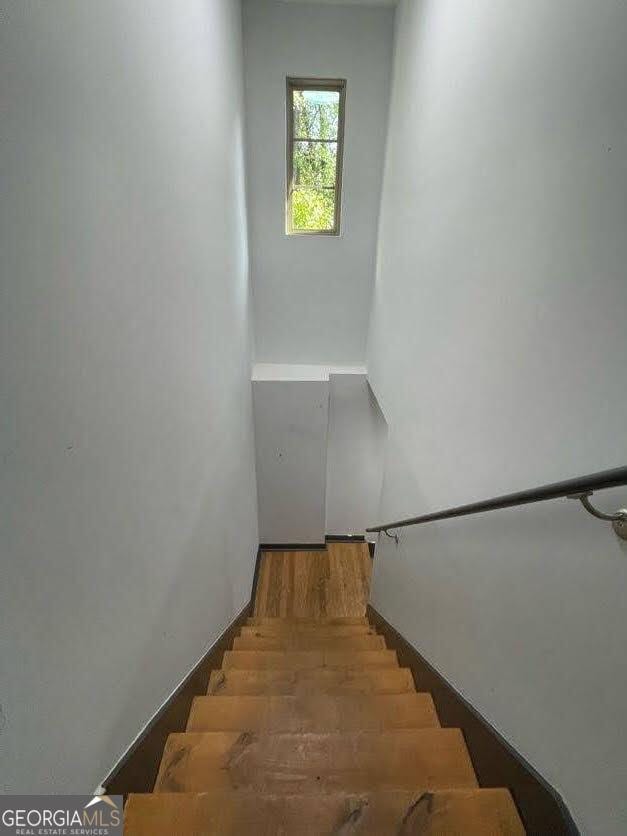 185 Glenrose Cir SW, Atlanta, GA 30354 - stairway with wood finished floors