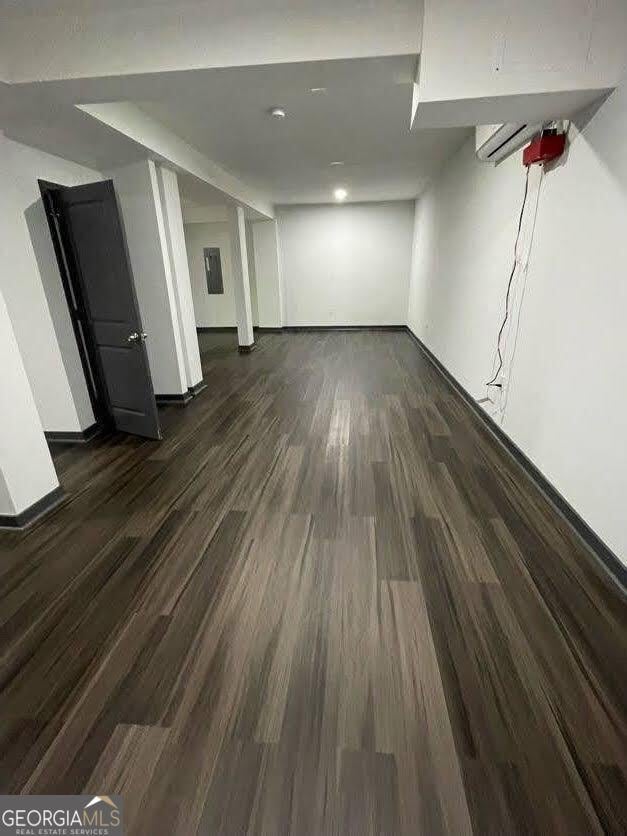 185 Glenrose Cir SW, Atlanta, GA 30354 - below grade area with dark wood-style flooring and baseboards