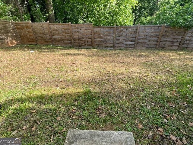 185 Glenrose Cir SW, Atlanta, GA 30354 - view of fenced backyard
