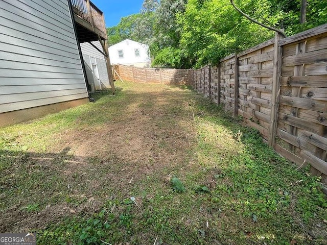 185 Glenrose Cir SW, Atlanta, GA 30354 - fenced backyard featuring a balcony