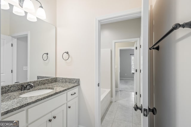 104 Bonny Oaks Dr, Lagrange, GA 30240 - bathroom with vanity, tile patterned floors, and a bath