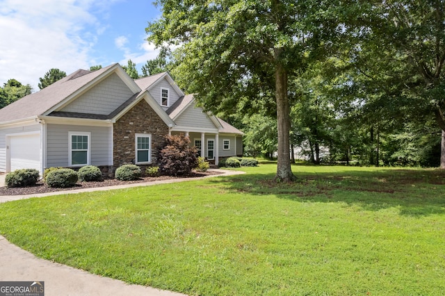 104 Bonny Oaks Dr, Lagrange, GA 30240 - view of front facade with stone siding, a front lawn, and a garage
